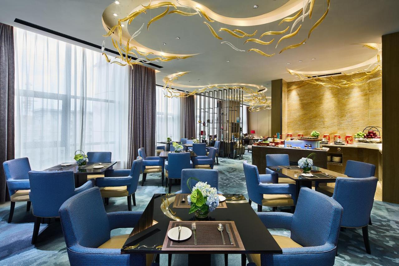 Wanda Realm Qiqihar Hotel Buitenkant foto