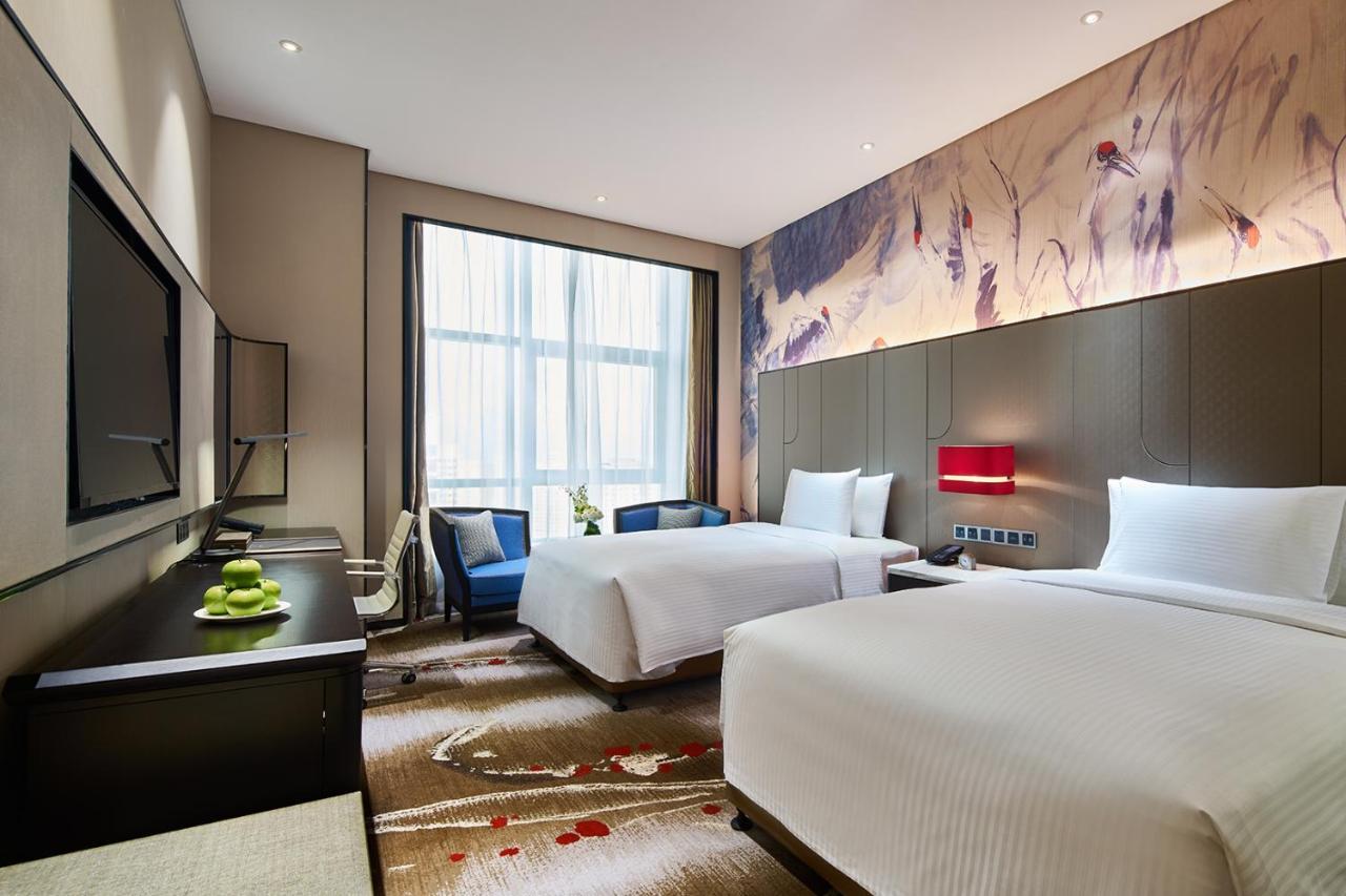 Wanda Realm Qiqihar Hotel Buitenkant foto